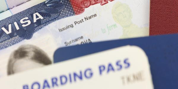 Visa and boarding pass