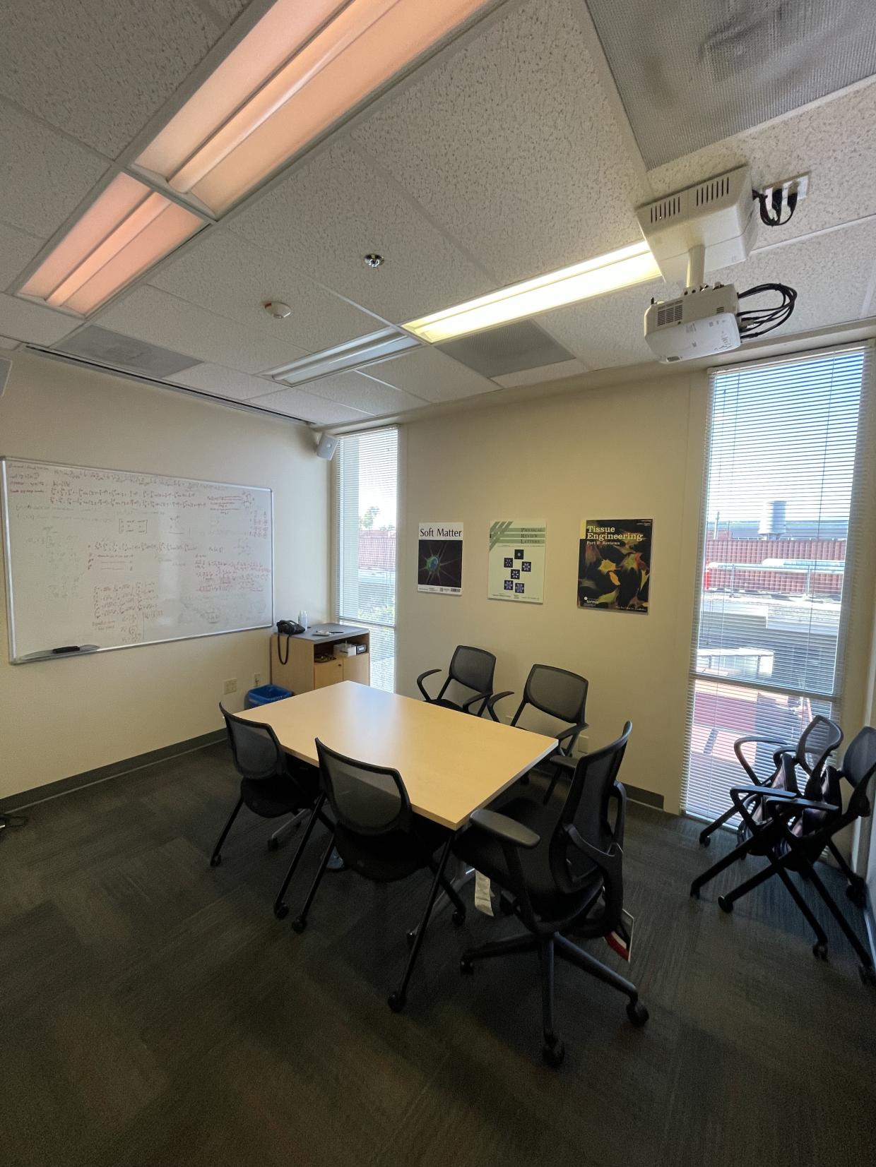 Table , chairs , white board 