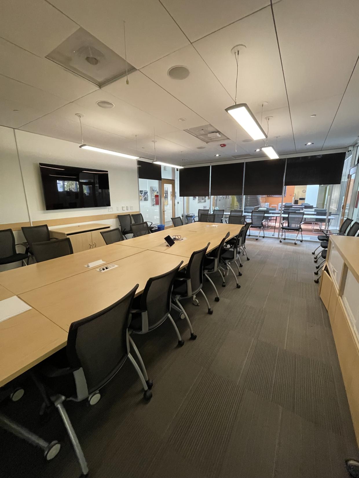 table , chairs , projector , white board 