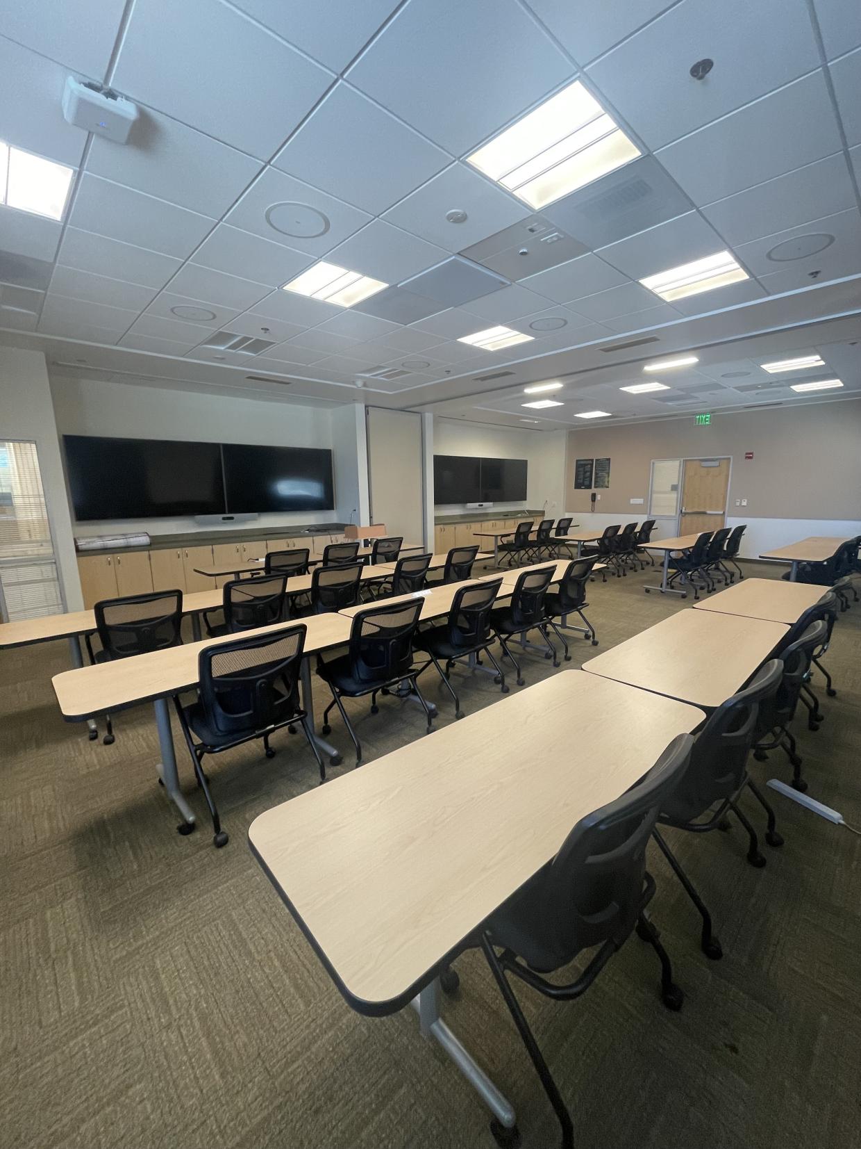 Table , chairs and display screen
